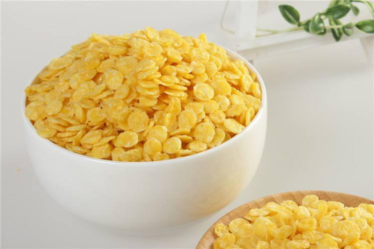 Microwave processing of corn flakes and nutrition enhancement